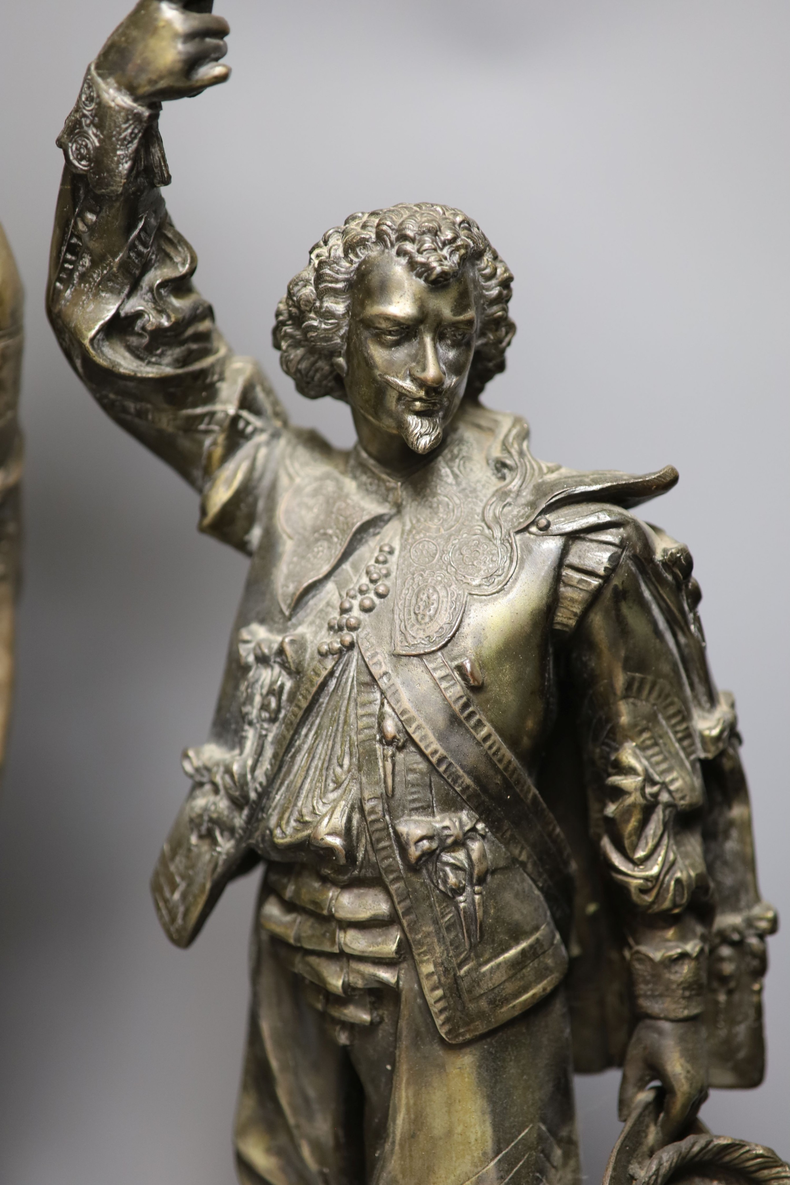 A pair of patinated spelter ’cavalier’ table lamps, early 20th century, 76 cm